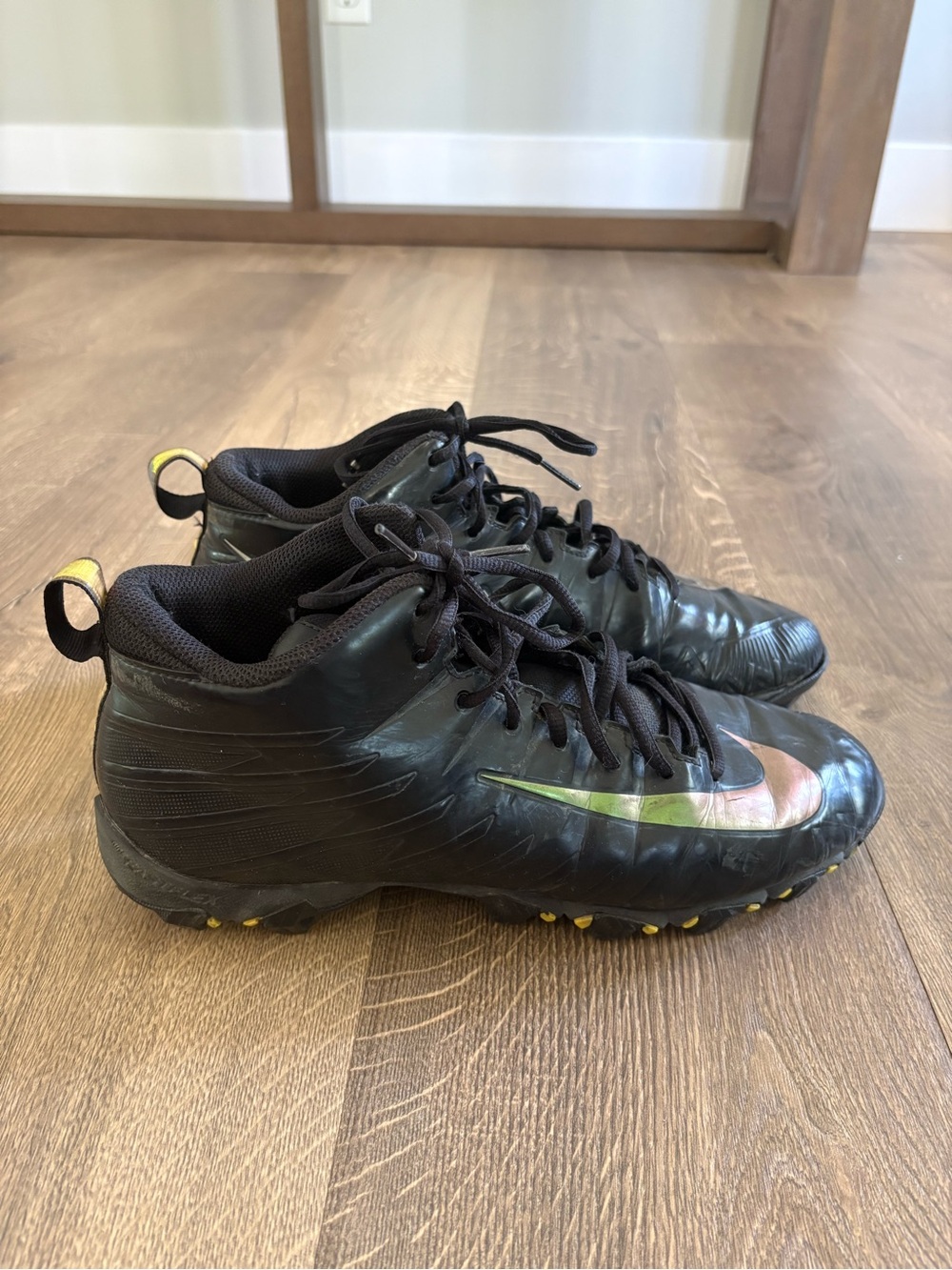 Men’s Nike Black Football Cleats with Iridescent Swoosh